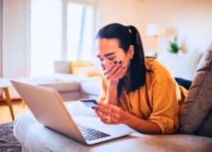 Lady looking at a laptop