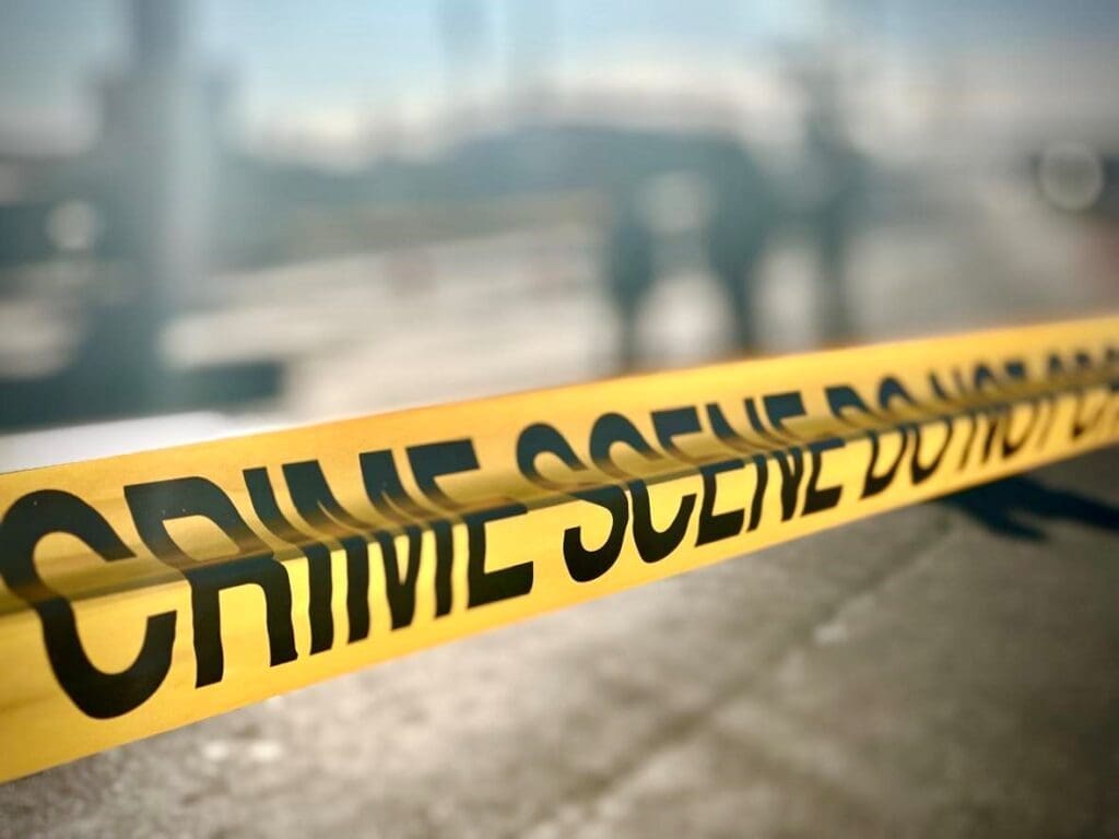 A photo of a yellow tape stating crime scene