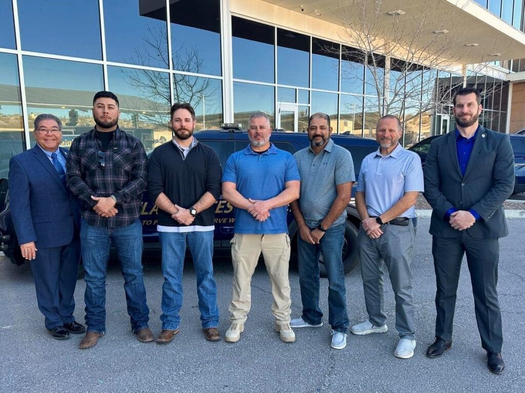 A photo of five police officers