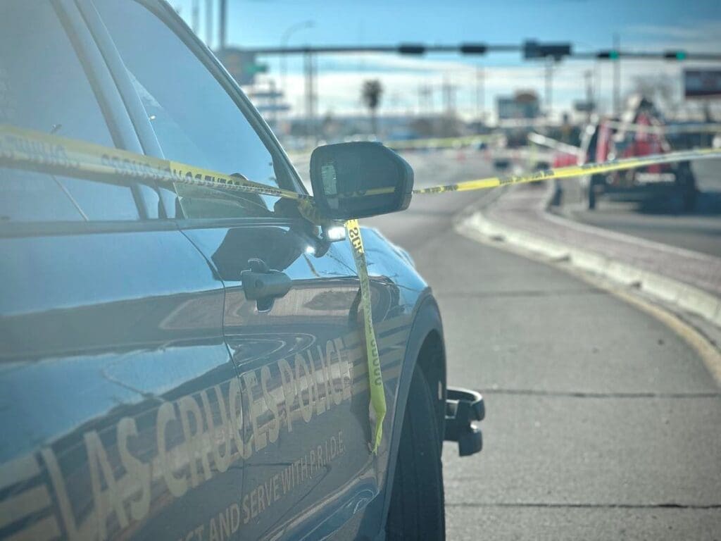 LCPD vehicle with caution tape tied to it.