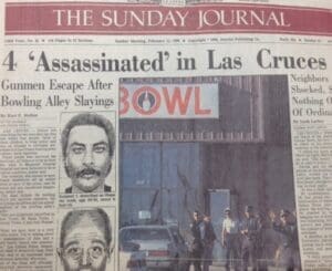 A photo of a newspaper with information about the mass shooting