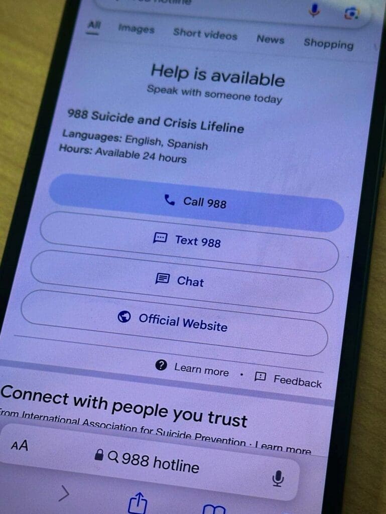 Cell phone with Suicide and Crisis Hotline information