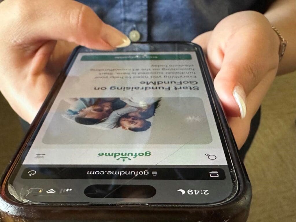 A photo of someone holding a cell