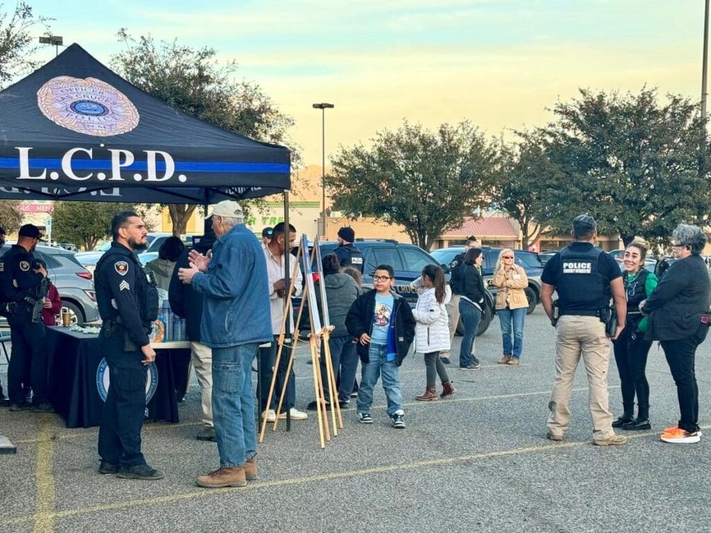 LCPD Community Outreach talking to people at an event.
