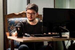 Man working on a computer.
