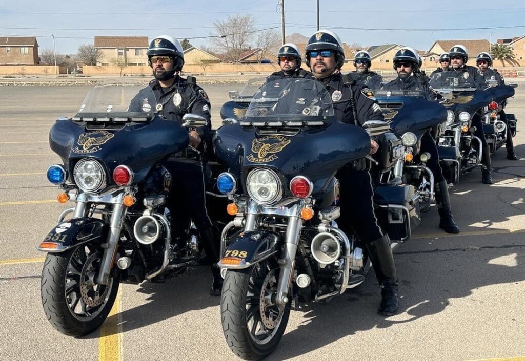 Eight LCPD motorcycle patrol men on their motorcycles.