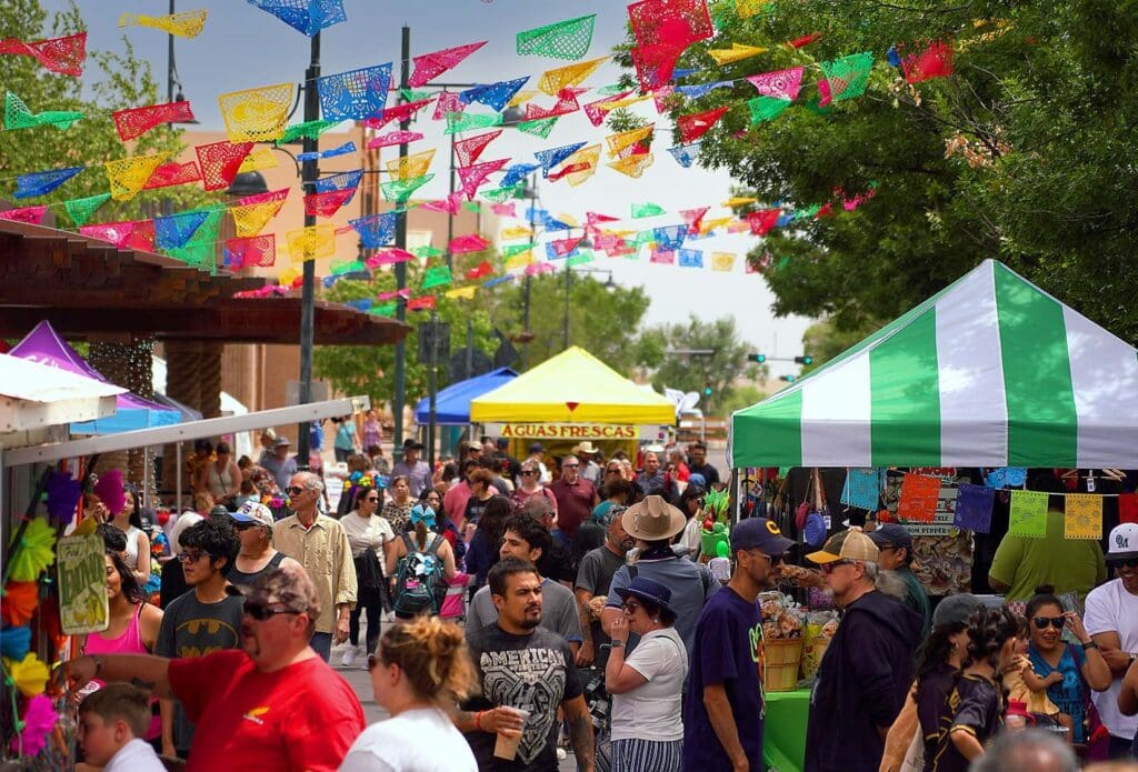 A photo of a group of people in the plaza