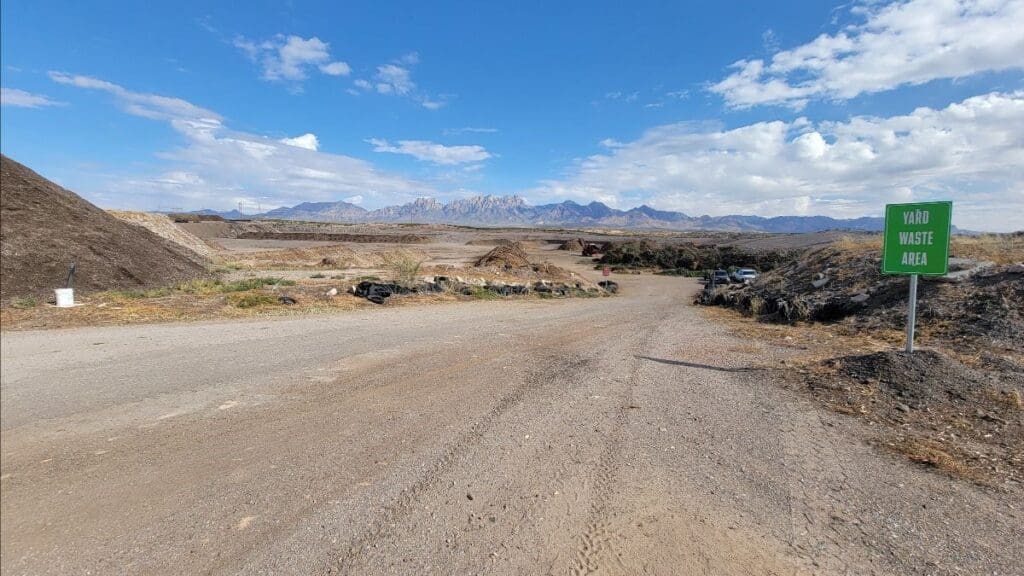 Dirt road with mountains in the background.