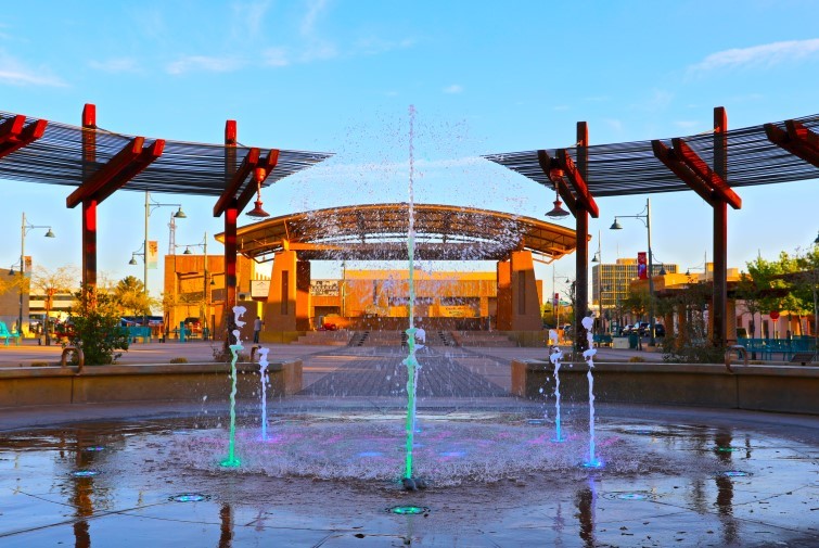 Roberto Estrada Stage behind a splash pad.