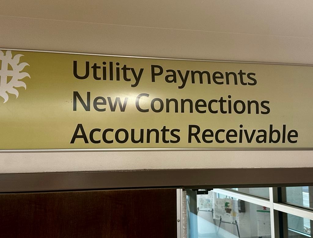 Utilities sign inside of City Hall.