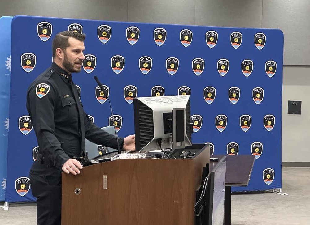 Chief Story standing at a podium.