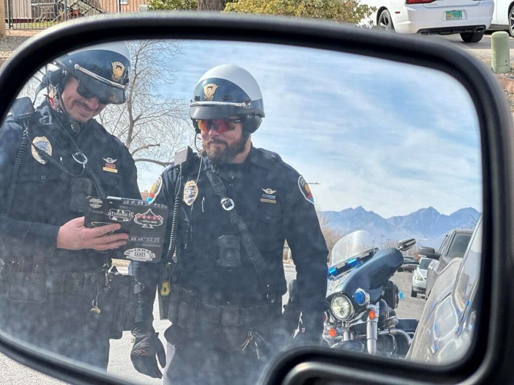 Two patrol officers talking.