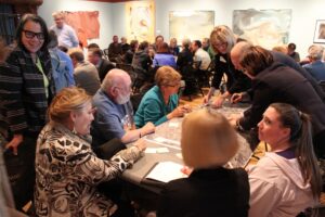 A full house of roughly 50 residents and other stakeholders reviewing maps and providing input during the kick-off to our last Downtown Master Plan update in 2016.