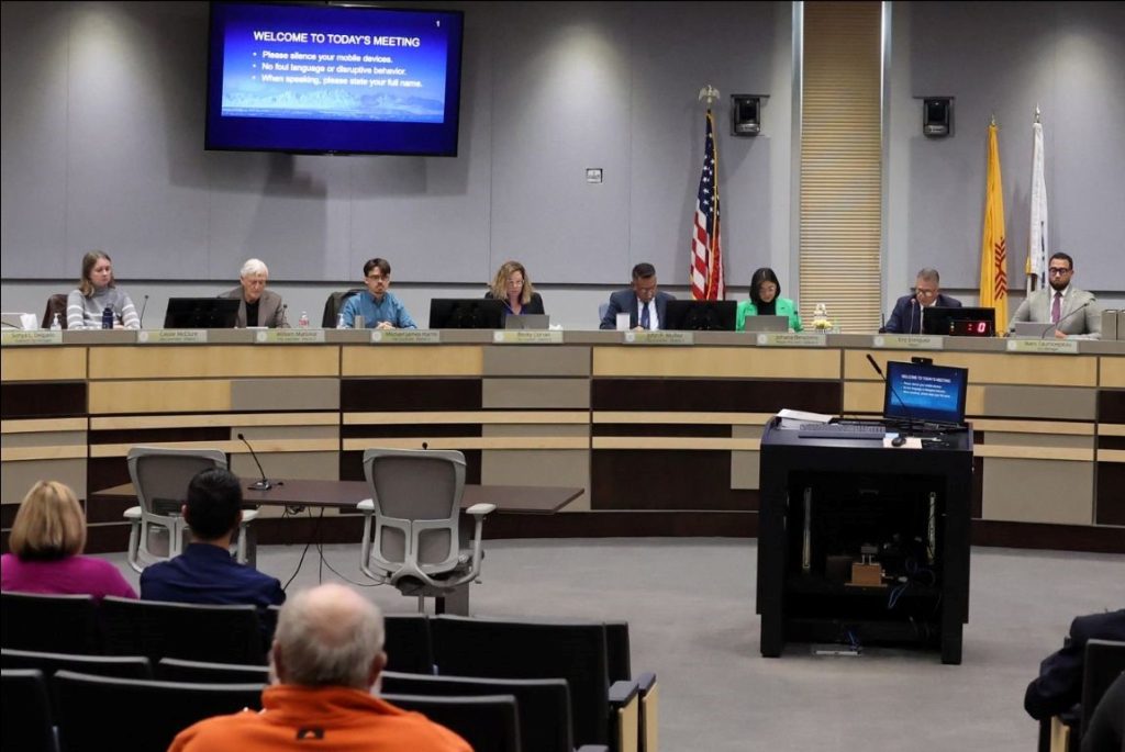 City councilors, mayor, and city manager at the City Council Meeting.