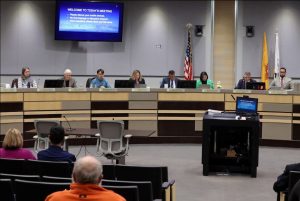 City councilors, mayor, and city manager at the City Council Meeting.