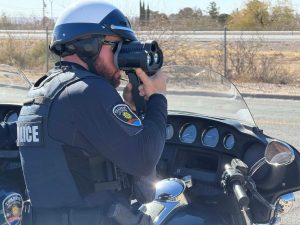 LCPD motorcycle officer conducting radar.