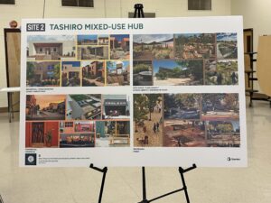 A photo of a display with different photos depicting what the Tashiro/Valley area could look like with businesses on it.