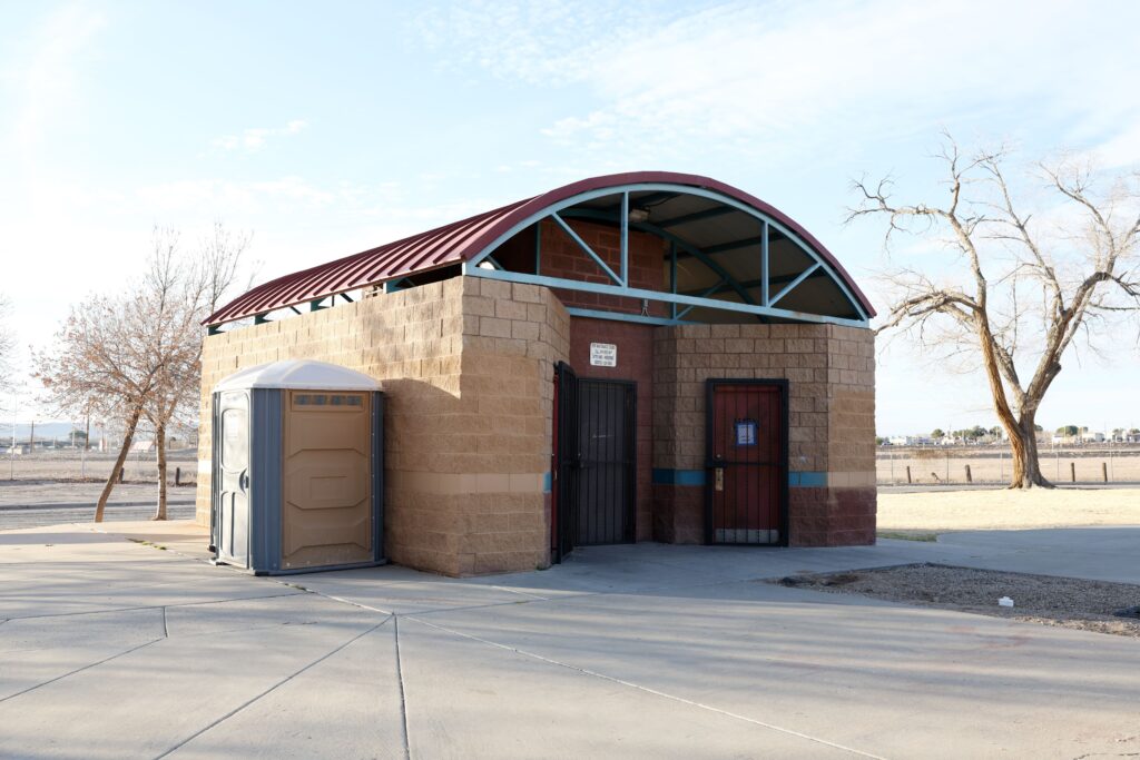 Apodaca Park Restrooms with an outhouse on the side.