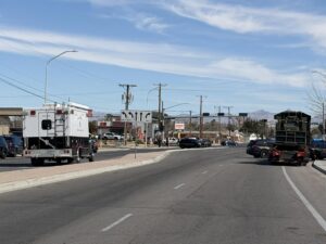 Police vehicles blocking an intersection.